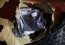 Îmbrăcăminte și parfumuri contrafăcute, descoperite de polițiștii de frontieră de la Calafat