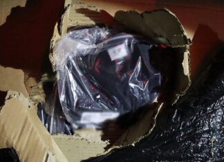 Îmbrăcăminte și parfumuri contrafăcute, descoperite de polițiștii de frontieră de la Calafat